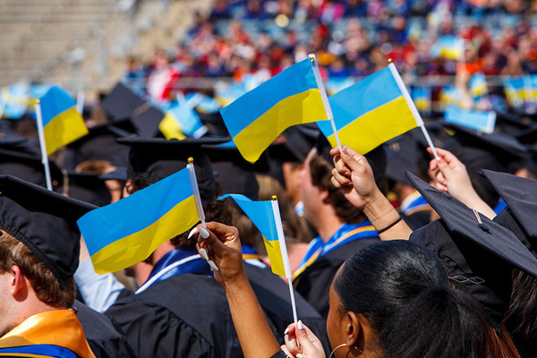 May 15, 2022; Graduates wave Ukrainian flags at the Commencement 2022 ceremony. (Photo by Leah Ingle/University of Notre Dame)